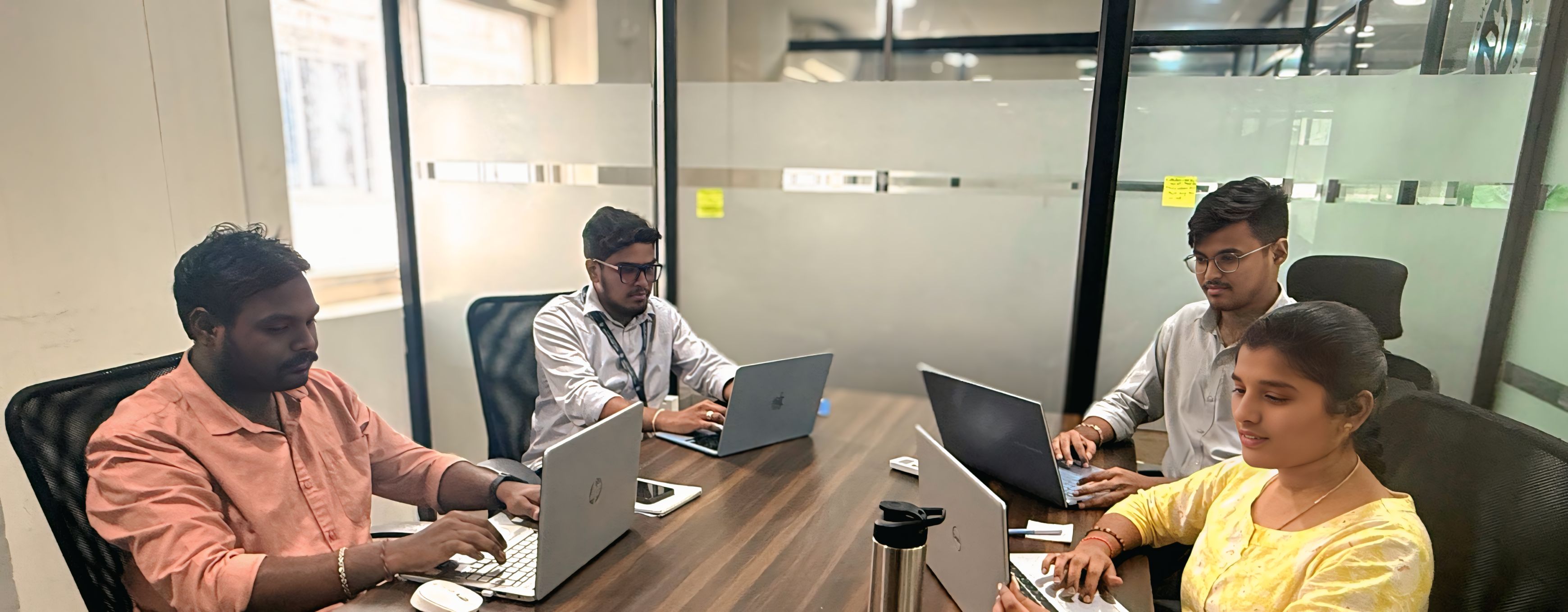 GGST Innovations development team collaborating at the office