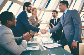 Business partners shaking hands after a successful meeting