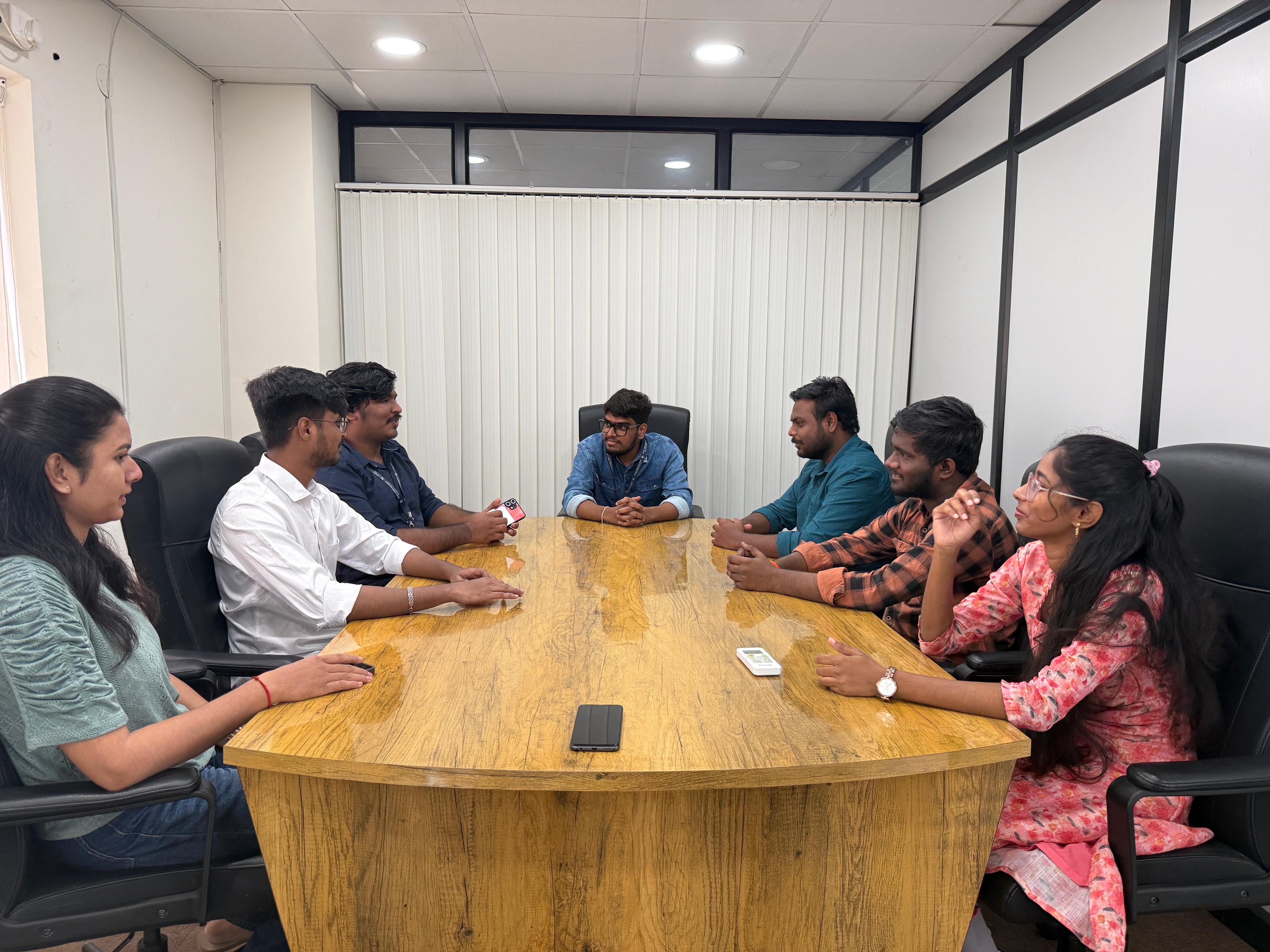 GGST team discussing ideas together
